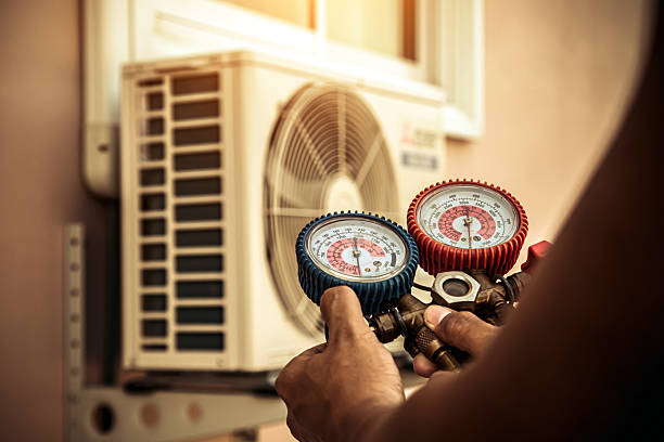Professional Air Conditioning Service technician working in Snow Camp, NC